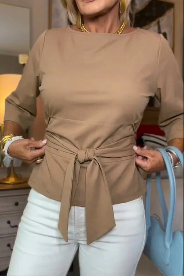 Conception Elegant top with a bow at the waist